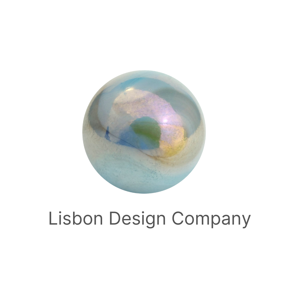 Lisbon Design Company logo: a pearl sphere with blue, sea glass, lilac, and champagne reflections.